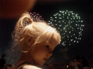 girl watching fireworks