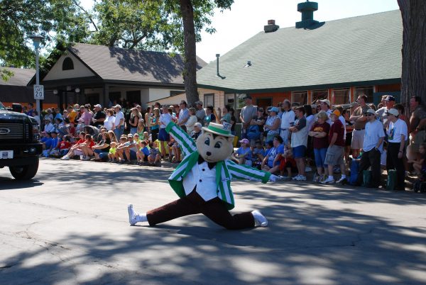 State Fair Gopher doing the splits during a parade at the Minnesota State Fair