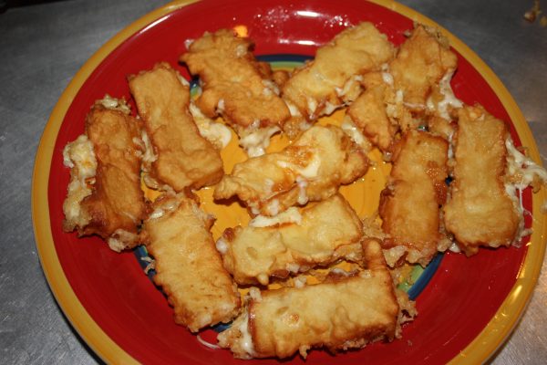 Deep-fried cheese on a plate