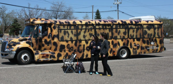 Visitors waiting to board the shuttle at the Como Zoo Park and Ride in St. Paul, Minnesota