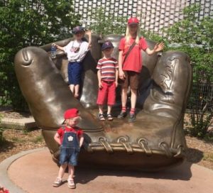 Four Kids Standing in the Target Field Giant Glove before a Twins Baseball Game in Minneapolis Minnesota