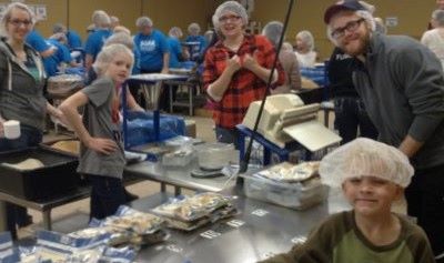 Family Volunteering at Feed My Starving Children