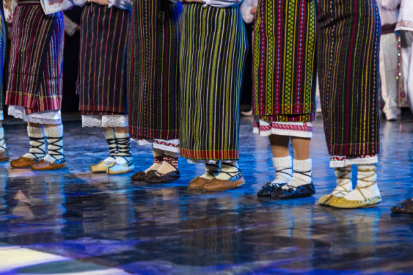 Feet of folk dances lined up on stage