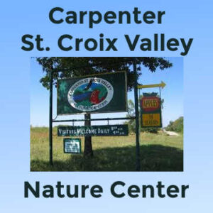 Sign: "Carpenter St. Croix Valley Nature Center: Visitors Welcome Daily 8:00 a.m. to 4:00 p.m".; Yellow Arrow points to "Apples"