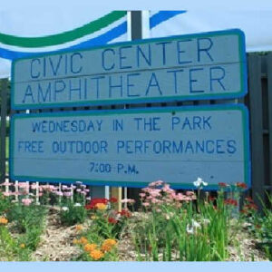 Civic Center Park Amphitheater Sign announcing Wednesday in the Park Free Outdoor Performances at 7pm -