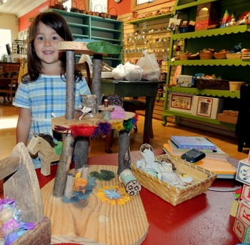 girl making fairy house at Heartfelt in Minneapolis, Minnesota