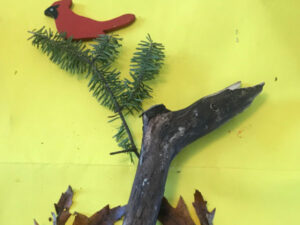 Winter Tree Art made with found natural objects and a red cardinal toy