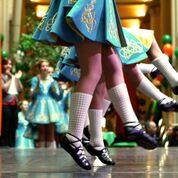 Legs and feet of Irish Dancers at the annual St. Patrick's Day Celebration at The Landmark Center, St. Paul, Minnesota