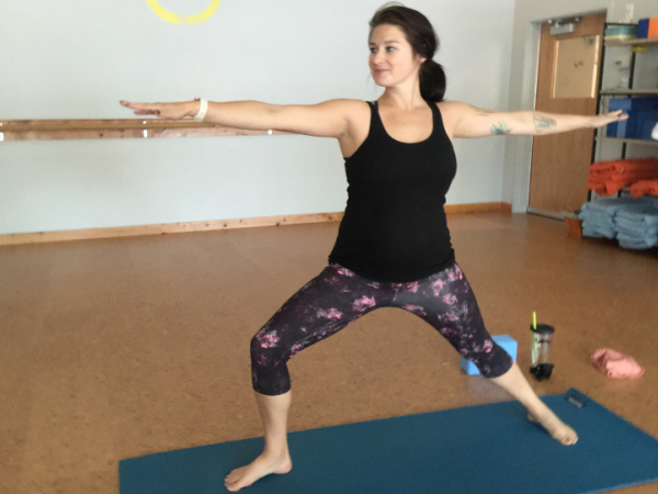 Woman doing yoga at Blooma Prenatal Yoga