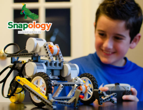 Snapology Summer Camps - Boy Building LEGO robot