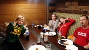 Family enjoying at meal at Campfire Kitchen at the Great Wolf Lodge in Bloomington, MN