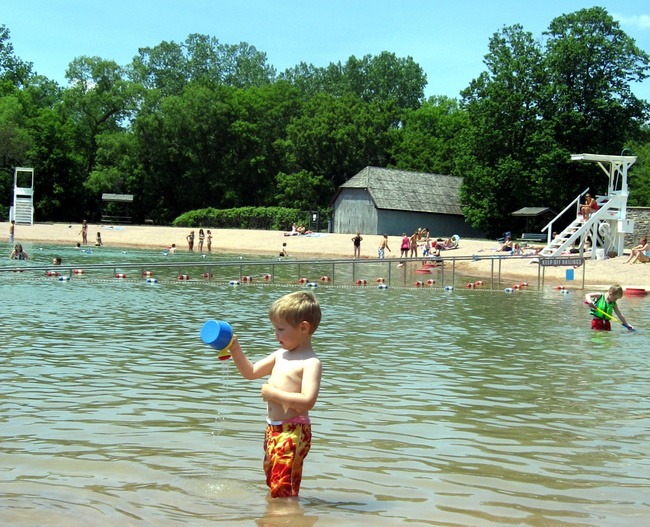 Child swimming at Flandrau State Park