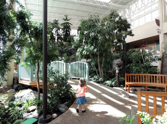 Girl walking along paths in Woodbury Minnesota's Indoor Central Park