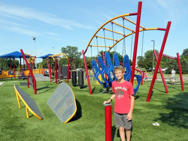 Boy at start of Schaper Park Challenge Course in Golden Valley Minnesota - Best Twin Cities Playgrounds