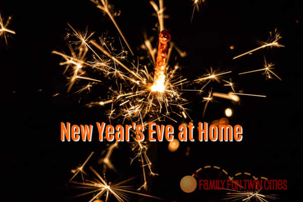 New Years Eve at home banner with sparkler in background - Family Fun Twin Cities