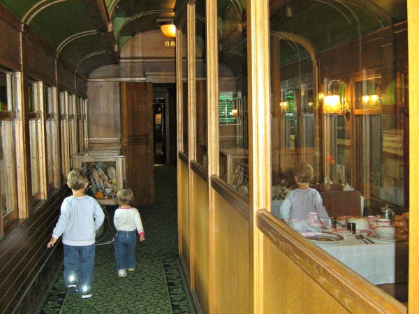 Kids exploring dining car at Duluth Depot Museum