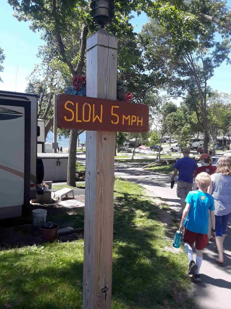 speed limit sign says slow