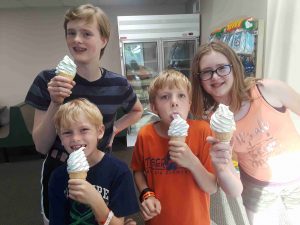 four kids and their ice cream cones