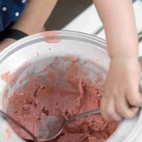 little fingers scooping up fresh ice cream