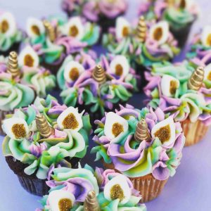 purple green white gold unicorn cupcakes