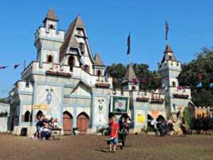 Boy in front of castle at the Minnesota Renaissance Festival