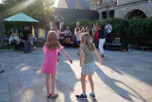 ASI courtyard, kids dancing