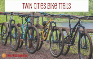 Bikes against a wooden fence - Twin Cities Bike Trails - Family Fun Twin Cities