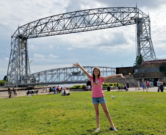 Girl posing in front of bridge in Canal Park on Lake Superior 