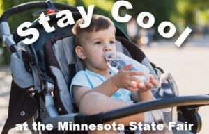 Boy in stroller drinking water: Stay Cool at the Minnesota State Fair