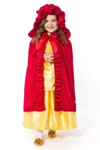 Girl dressed as Little Red Riding Hood with Little Adventures Deluxe Red Cloak