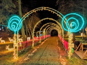 Tunnel of Holiday lights with lighted deer along the side. Spirits of Lights, Duluth Minnesota