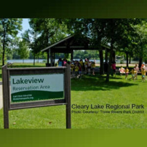 Sign at Cleary Lake Regional Park with Picnic Shelter in the Background