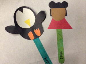 Popsicle Puppets of Ella and Penguin - characters in books by Megan Maynor and Illustrated by Rosalinde Bonnet