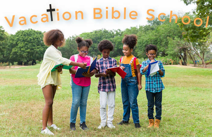 Kids writing in journals in an open field "Vacation Bible School"