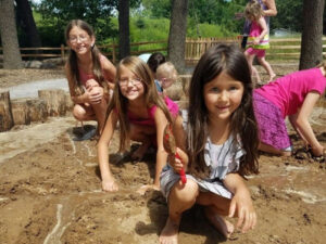Kids playing in the sand at Springbrook Nature Center