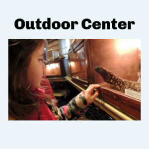Girl viewing animals inside the Outdoor Center in Eden Prairie, MN