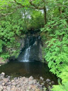 Hidden Waterfall in Dunvegan Castle Garden on Isle of Skye