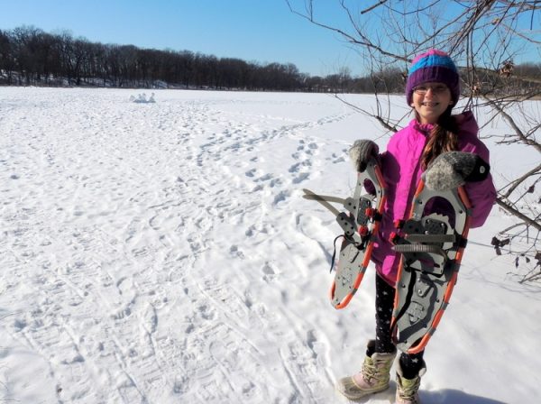 girl with snowshoes